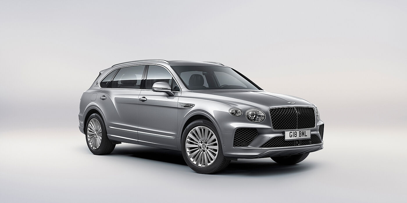 Bentley Tunbridge Wells Bentley Bentayga Extended Wheelbase luxury SUV front three quarter view in Moonbeam paint with 21 inch five spoke painted wheels