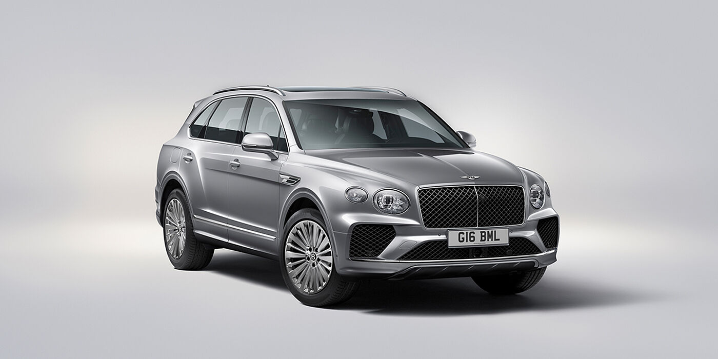 Bentley Tunbridge Wells Bentley Bentayga luxury SUV front three quarter view in Moonbeam paint with matrix grille and 21″ 5 spoke painted wheels