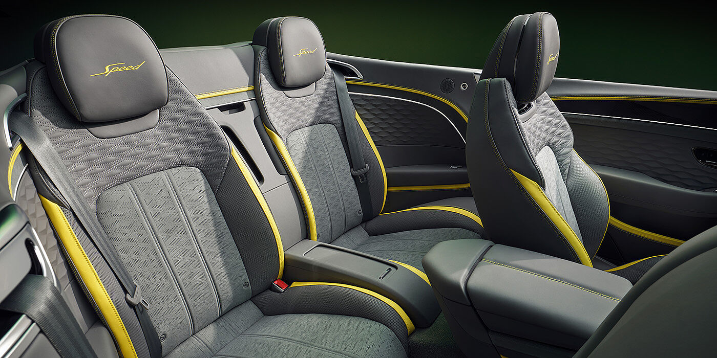 Bentley Tunbridge Wells Bentley New Continental GTC Speed convertible rear interior with unique Speed colour split in Gravity Grey and Cyber Yellow hide colours, and contrast stitched headrest emblems 