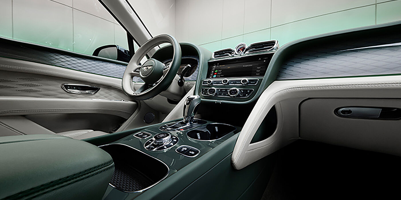 Bentley Tunbridge Wells Bentley Bentayga Atelier Edition SUV front interior in Portland and Cumbrian Green hides with Dark Tint Diamond Brushed Aluminium veneer
