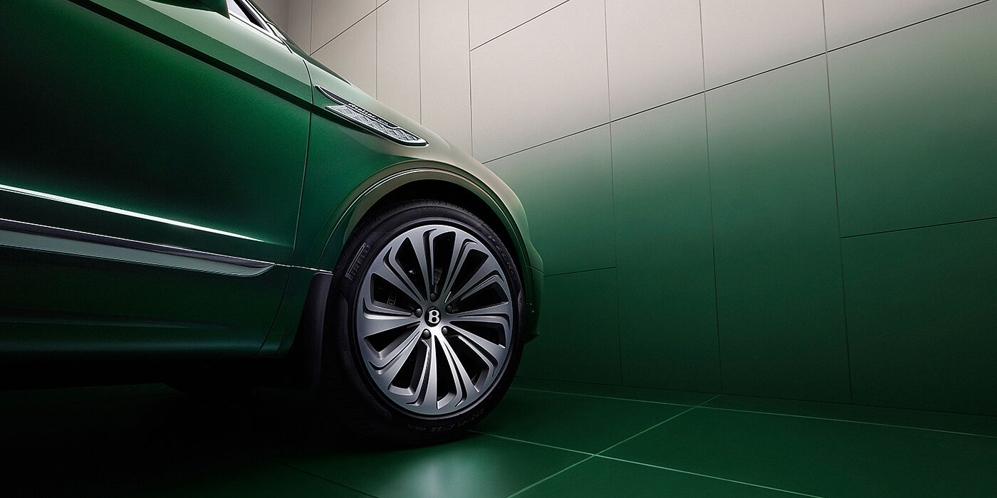 Bentley Tunbridge Wells Bentley Bentayga Atelier Edition SUV in Light Emerald green paint front side detail with 22 inch 10 spoke wheel