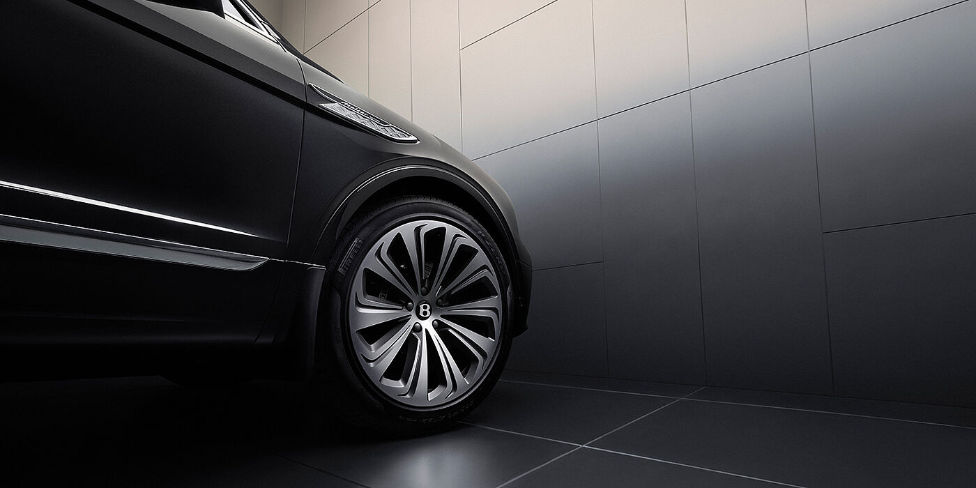 Bentley Tunbridge Wells Bentley Bentayga Atelier Edition SUV in Onyx black paint front side detail with 22 inch 10 spoke wheel