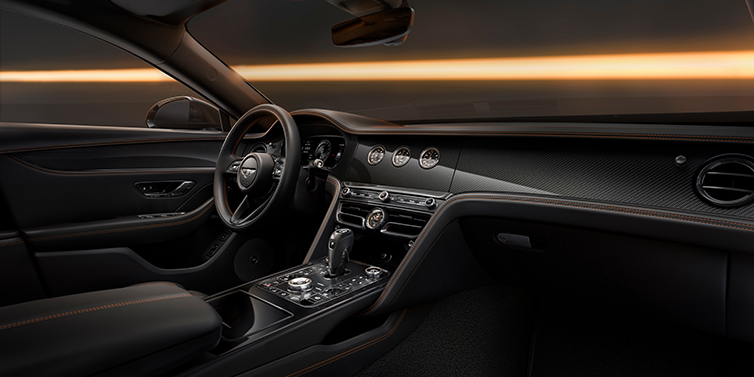 Bentley Tunbridge Wells Bentley Flying Spur Black Edition sedan front interior in Beluga black hide with High Gloss Carbon Fibre veneer